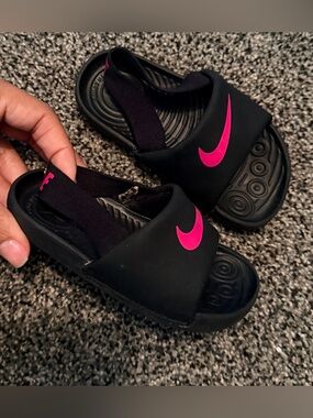 Nike Kids Black Slides with Hot Pink Swoosh